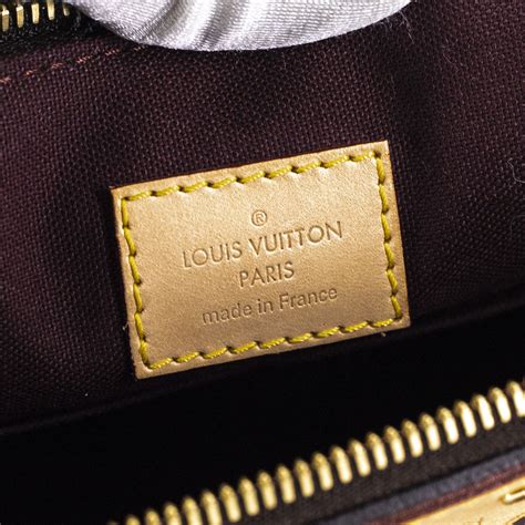 louis vuitton tag inside bag